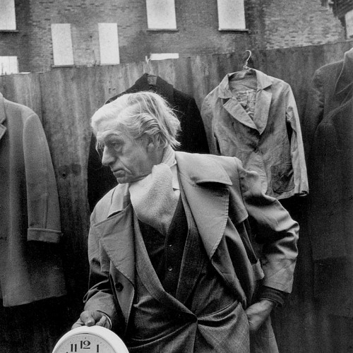 Edward with clock, off Cheshire Street Market, 1983