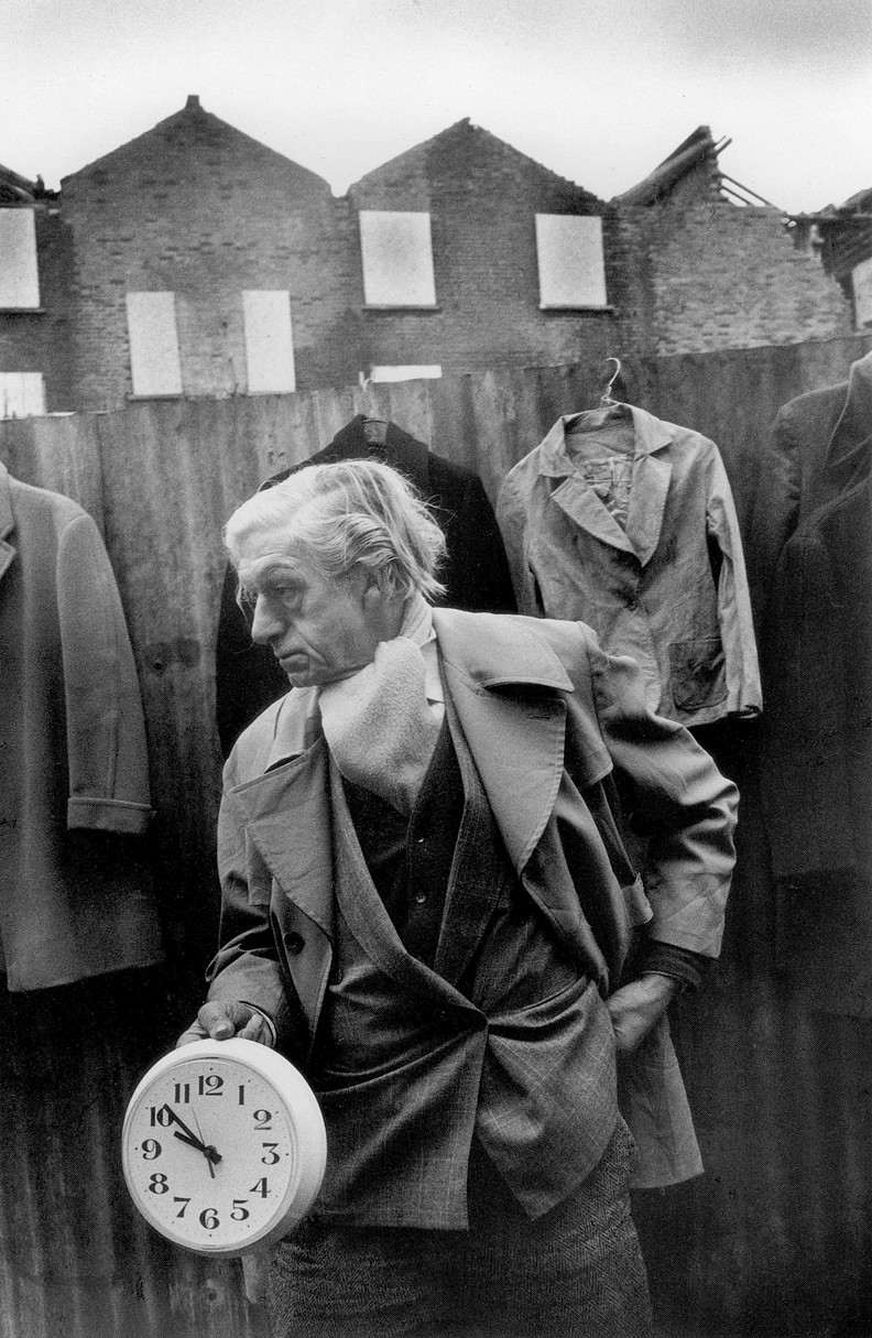 Edward with clock, off Cheshire Street Market, 1983