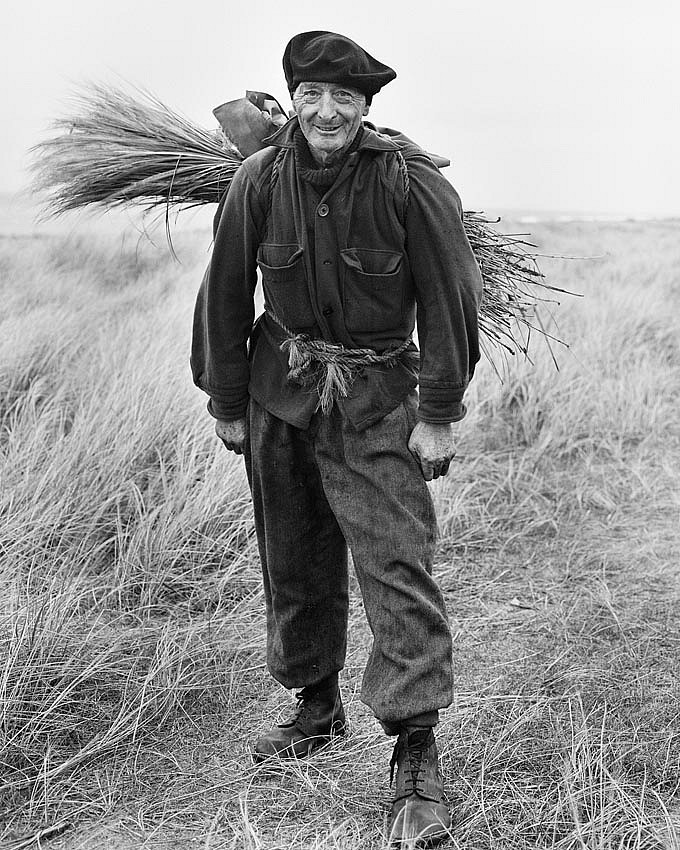 Chris KILLIP, Geoff Lace Gathering Bent (Marram Grass), The Lhen, Andreas, Isle of Man.
1970
