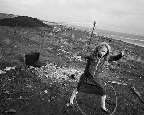Helen and her Hula-hoop, Seacoal Camp, Lynemouth, Northumbria, 1984 © Chris Killip Photography Trust/Magnum Photos